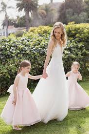 You want a wedding dress that suits the exotic locale and takes his breath away when he sees you walking on the sand towards him. Bel Air Wedding With A Tropical Ombre Floral Arch Ruffled