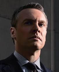 Tate Donovan as Tom Shayes