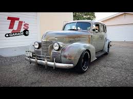 Image result for Trojan Maroon 1939 Oldsmobile