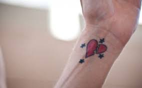 Tattoos Of Broken Hearts Wrist Tattoos Of Broken Hearts Broken Heart Tattoo Broken Heart Tattoo Designs Hand Heart Tattoo