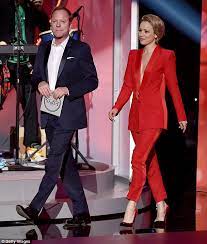 Information about mosley thompson manning height weight and their relationship like husband wife boyfriend or girlfriend with their cars house property. Peyton Manning S Daughter Mosley Clings To His Leg At The 2015 Espys Daily Mail Online