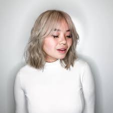 Platinum Wavy Bob With Seamless Layers And Curtain Bangs The Latest Hairstyles For Men And Women 2020 Hairstyleology Braids For Medium Length Hair Medium Length Hair With Bangs Shoulder Length Bob