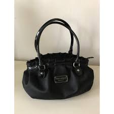 Choose iconic pieces from the world's best labels. Sac A Main En Tissu Ted Lapidus Noir 6465168