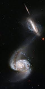 Encontre imagens stock de galáxia espiral . Arp 87 And The Two Spiral Galaxies Ngc 3808 And Ngc 3808a Are In An Early State Of Merging Already A B Hubble Space Telescope Hubble Pictures Space Telescope