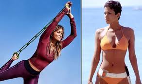 Halle maria berry was born maria halle berry on august 14, 1966 in cleveland, ohio and raised in bedford, ohio to judith ann hawkins, a psychiatric nurse & jerome jesse berry, a hospital attendant. Halle Berry Recreates 007 Bikini Shot Talks Bond Fitness At 54 Choking During Sex Scene Films Entertainment Express Co Uk