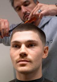 Kane's Buzz Cut Transformation: From Long to Short