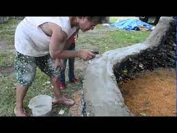Garden glass bottle retaining wall. Wine Bottle Garden Wall Youtube