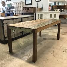 The table top was completely stripped, sanded then sealed with several coats of danish oil. Reclaimed Wood Dining Table Nadeau Miami