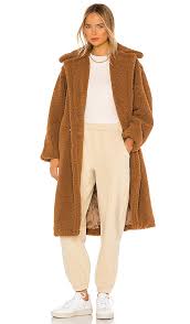 There is also a simple black dress with a peek of lace at barneys. Apparis Daryna Faux Fur Coat In Camel Revolve