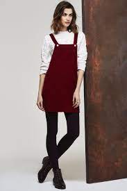 As Seen In Now Magazine Pinafores Are Making A Comeback Especially When They Re As G Denim Pinafore Dress Outfits Winter Dress Outfits Pinafore Dress Outfit