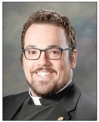 15 men in formation for the priesthood