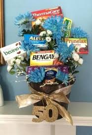 21st Birthday Present Ideas For Him Nz Best Gift For 40 Year Old Man Old Age Remedies Tucked Into A Flower Arrangement Is A Comforting Birthday Gag Gifts 50th Birthday Gag Gifts 60th Birthday Party