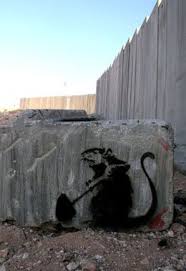 Well Known Uk Graffiti Artist Banksy Hacks The Wall The Electronic Intifada Banksy Graffiti Artist Banksy Art