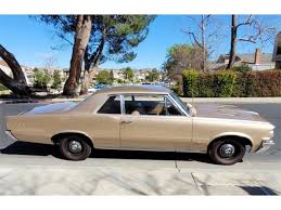 Image result for Saddle Bronze 1964 GTO