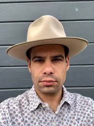 Is there evidence supporting hats with fur trim in Viking Age?