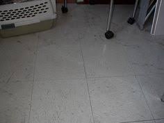 Add a few drops of dish soap to the vinegar and water solution. Removing Deep Scuffs Grime And Scratches From An Old Linoleum Tile Floor Trying This On The Foyer Tiles Today Clean Linoleum Floors Tile Floor Flooring