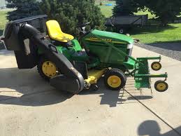 Plug aerator has 24 galvanized rust. Deere Front Mount Dethatcher Gir X500 Series Green Tractor Talk