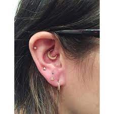 Stacked Love Piercing Yg Black Diamond Bezel On Top Of A Yg Pyramid Bead Cluster Yg Kolo Daith Done By Adrian Castillo At Ny Adorned Earings Piercings Piercing Ny Adorned