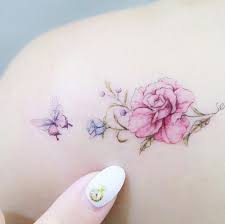 dainty flowers by mini lau j aime bcp la delicatesse du papillon tattoos floral tattoo tattoo artists