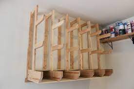 This type of fixture can be as simple a quickly installed wall garment rack consists of a rod from which to hang clothing. Innovative Diy Wall Mount Lumber Rack For Boards And Sheet Goods Gadgets And Grain