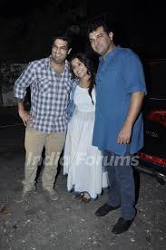 Kunal Roy Kapoor poses with Vidya Balan and Siddharth Roy Kapur at the  Special Screening of Haider Photo