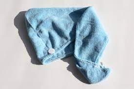 Lay the microfiber towel out on a flat surface, such as a counter top or bed, with the towel spread out. This 6 Hair Towel Saves My Curls From Frizzing When I Air Dry Glamour