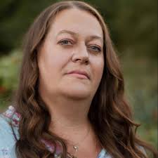 What's the symbolism behind the half Canadian-half American flag?