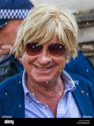 Conservative MP Michael Fabricant, seen here entering Downing Street,  tweets challenge to US Embassy to use a US Marine to shoot down the Trump  baby blimp due to fly during Trumps UK