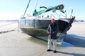 Beached Boat Leaves Sailor High And Dry In Sea Isle Sea