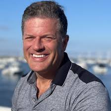 Sign: Woman Punched, Threw, And Doused Puppy in Hot Sauce and Pickle Juice  after Pup had an Accident