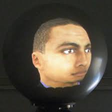 SphereAvatar: A Situated Display to Represent a Remote Collaborator