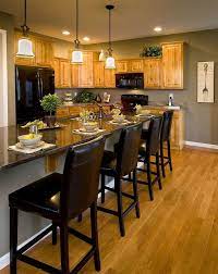 This next combination will not give you a headache. Model Kitchen With Oak Cabinets Like The Paint Color Looking For Color Schemes For A Poss Kitchen Wall Colors Kitchen Colour Schemes Kitchen Inspirations