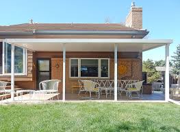 Champion patio enclosures, porch enclosures, and patio covers are custom designed and manufactured to meet your needs, budget and lifestyle. Teton Patio Cover With Flat Roof Panels