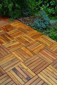 You can place these tiles on any hard and flat surface like cement. Deck Tiles Interlocking Tiles Porcelain Tiles Deck Tiles Patio Design Backyard Patio Designs