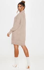 Welcoming this autumn's new trend, our beautiful mustard ribbed knit oversized high neck jumper. Camel Oversized High Neck Knitted Jumper Dress Prettylittlething