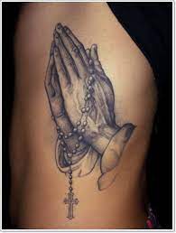 The dove holds great significance above the praying hands and it creates and earnest and beautiful look. Top 25 Praying Hands Tattoos For The Faithful Praying Hands Tattoo Hand Tattoos Praying Hands Tattoo Design