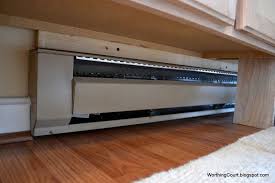 baseboard heating under kitchen cabinets