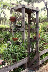 One Of The Entrances Into My Garden Made It And The Fence From Pallets Garden Arches Pallets Garden Rustic Gardens
