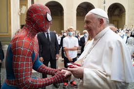 A statue of pope st. Pope Francis Shakes Hands With Spider Man Before His Hospital Visit