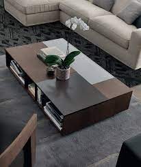 It is unique in style because of its rotating top that can be used for different functions. Trendy Coffee Table Ideas For The Modern Minimalist Trendy Coffee Table Coffee Table Design Minimalist Coffee Table
