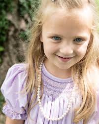 I let Maria pick out the smocking plate and the floss colors