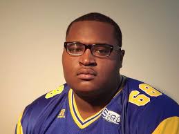 WILDCATS HOLD OFF KENTUCKY STATE FOR 36-21 WIN