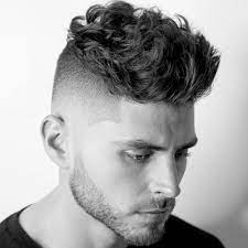 High Fade Messy Wavy Hair On Top Fade Haircut Popular Haircuts Haircuts For Men