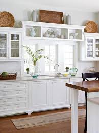 Update Your Kitchen On A Budget Decorating Above Kitchen Cabinets Above Kitchen Cabinets Kitchen Design