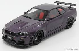 I really love purple so my entire garage of ten cars are all painted varying shades of purple. Otto Mobile Ot881 Scale 1 18 Nissan Skyline Gt R Nismo Z Tune R34 1998 Black Wheels Midnight Purple