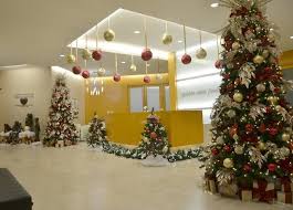 Office Lobby Decorated With Champagne And Burgundy Christmas Trees Office Christmas Decorations Office Christmas Gold Christmas Tree