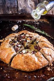 This breakfast concoction has mashed sweet potatoes and goat cheese mixed in and is topped with a runny fried egg. Potato Galette With Caramelized Onions Bacon Goat Cheese And Rosemary Olivia S Cuisine