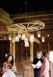 We will go over your wheel with a torch, bringing chandeliers, pot racks, wall décor and more. Creative Rustic Wagon Wheel Wedding Decoration Ideas Elegantweddinginvites Com Blog