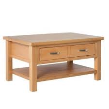It displays interesting reading and serves the saturday night pizza. London Oak Coffee Table Large Light Solid Wooden Table With Storage Drawer Shelf 5060359898753 Ebay