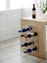 Rta Circlet Metal Floor Standing Wine Rack 14 Bottle Chrome At John Lewis Partners Shop wooden and stainless steel wine racks at a wine rack isn't just practical storage, it also makes an attractive display.